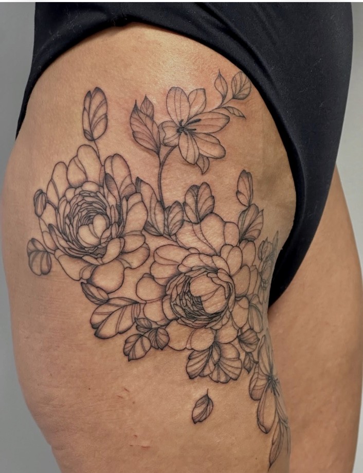 Floral tattoo by Maggie